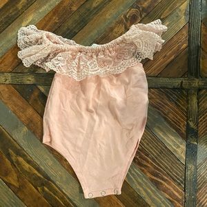 Bailey’s Blossoms onesie